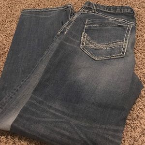 Lightly worn men’s buckle jeans